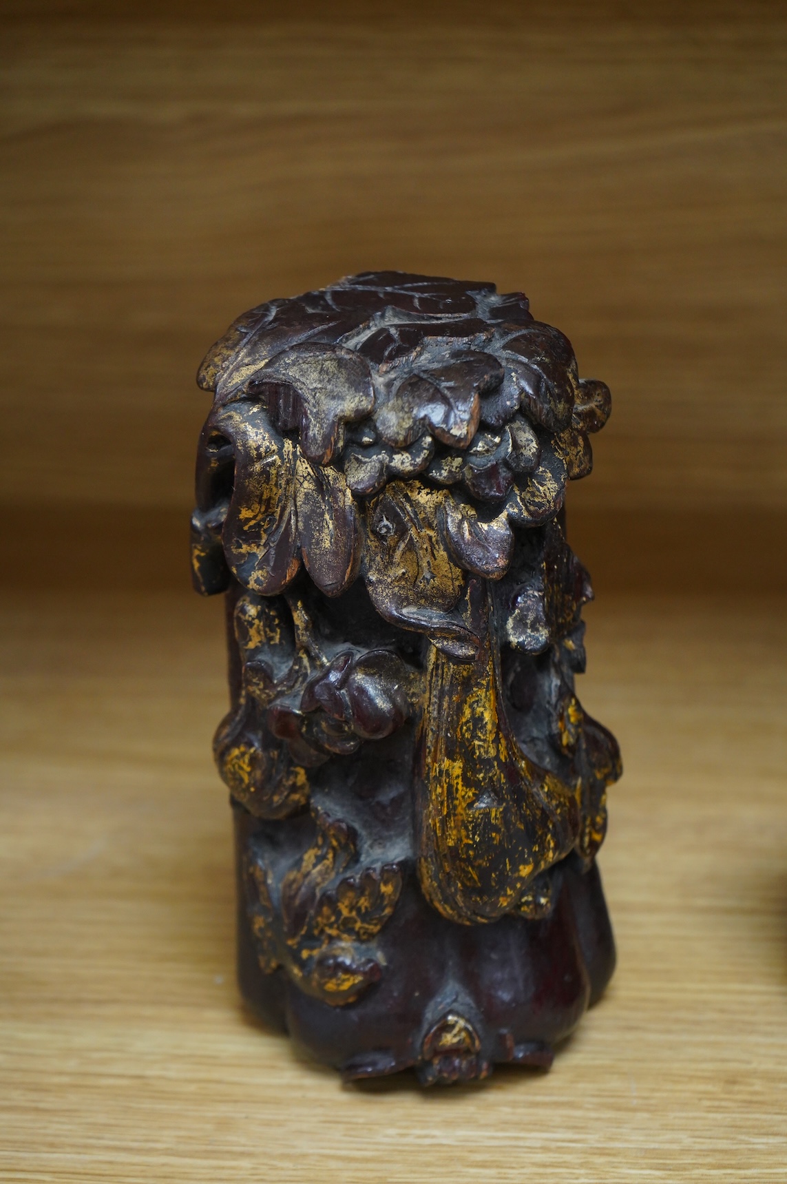 A Chinese burr wood brush pot, signed, and a gilt lacquered wood carving, 20cm